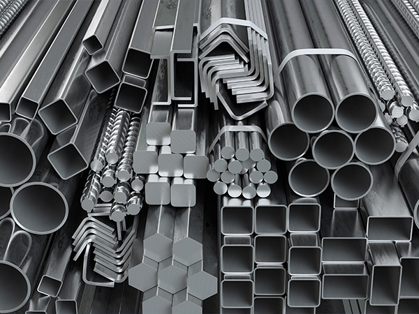 Different metal rolled products. Stainless steel profiles and tubes.