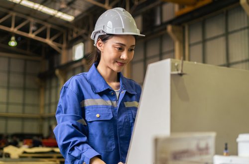 Asian-woman-industrial-worker-working-in-manufacturing-plant