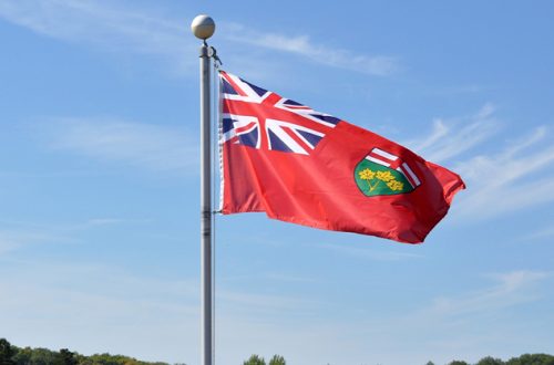 Ontario-flag-in-blue-skies