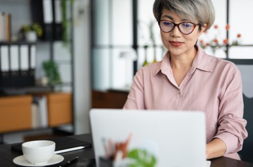 Asian-woman-working-on-laptop-at-home