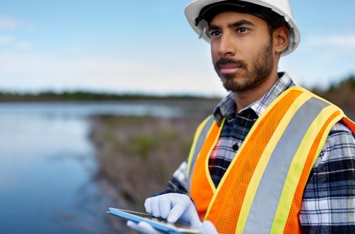 engineer-biologist-analysing-water-test-results-