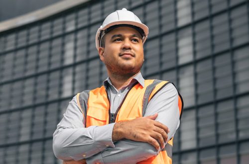 male-engineer-portrait-at-building-site